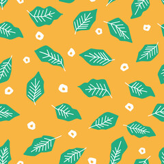 Seamless pattern with green leaves on yellow background. Vector illustration.