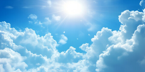 Sun-Kissed Clouds: A vibrant blue sky stretches out, dotted with billowing white clouds illuminated by a radiant sun. This serene landscape captures the tranquility and optimism of a clear day.