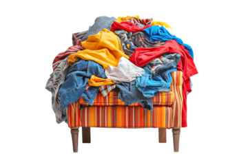 a home chair with a pile of bright clothes thrown haphazardly on it, an element of a teenager's room, an untidy person