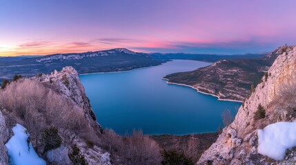 Naklejka premium A panoramic view of the Gorges du Verdon, capturing the vastness of the valley and the winding river's path through the landscape.