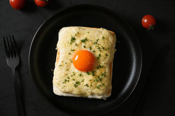 A Croque Monsieur. Croque Madame. Toast with Egg topped