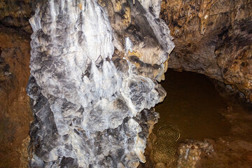 underground reservoir under the arches of the Bolshaya Azishskaya cave on the Lagonaki plateau in Adygea