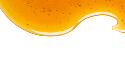 Golden honey dripping gracefully against a transparent background, perfect for food and sweet-themed designs. Isolated