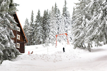 Ski lift ropeway,gondola on highland alpine resort.chairlift cableway.skiing snowboarding.mountain...