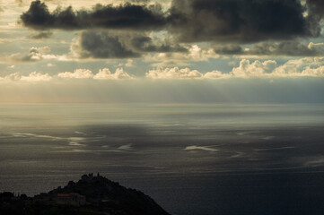 sunset over the Tyrrhenian Sea during a spring day with a cloudy sky, seen from Maierà, Cosenza
