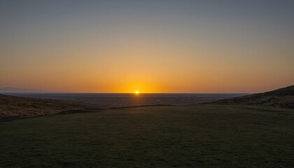Fototapeta premium Serene Sunset over Rolling Hills and Coastal Forest