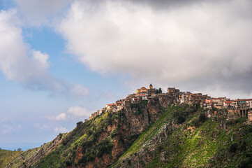 Naklejka premium top view of the village of Grisolia with a cloudy sky in the background, Cosenza