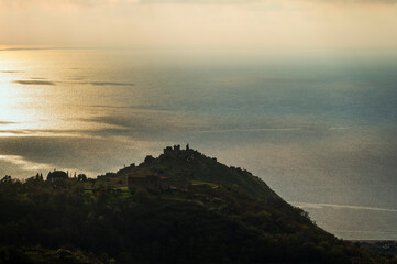 sunset over the Tyrrhenian Sea during a spring day with a cloudy sky, seen from Maier&agrave;, Cosenza