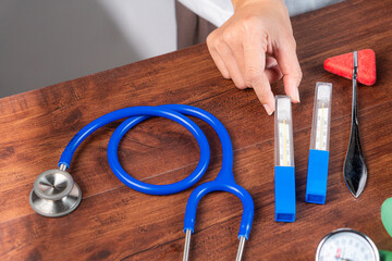 Medical Equipment on a Wooden Table
