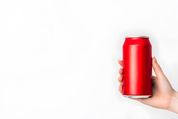 Hand holding can soda bottle isolated on white background
