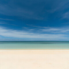 Obraz premium Serene Beach Photo: Ocean, Sky, Sand