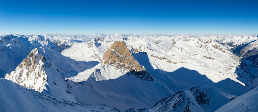 Wonderful wide majestic snowy austrian alps panorama in winter. beautiful mountain tourism sport  ski resort concept background