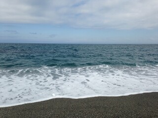 ebb and flow of waves.