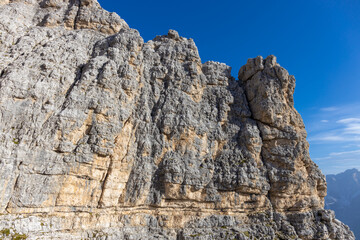 Dolomites rocky summits in the Alps. High tower peaks and sharp mountain rocky peaks of the Alps in the Dolomiti region, Italy. Beautiful scenic mountain range landscape in summer