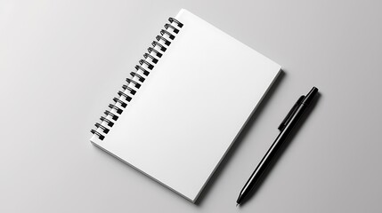 Blank Spiral Notebook and Black Pen Mockup on White Surface