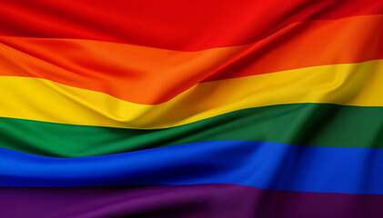 Obraz premium A vibrant rainbow flag waves proudly displaying LGBTQ+ pride.