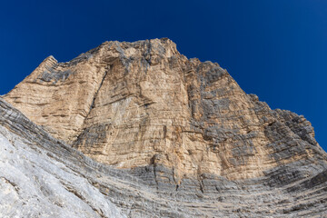 Dolomites rocky summits in the Alps. High tower peaks and sharp mountain rocky peaks of the Alps in the Dolomiti region, Italy. Beautiful scenic mountain range landscape in summer