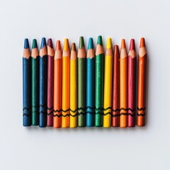 Colorful crayons neatly arranged in a creative display on a white background