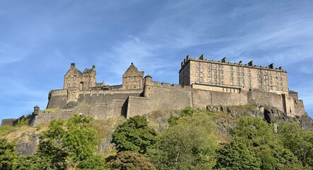 Fototapeta premium A low angle view of Edinburgh Castle against a blue sky background. 