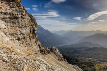 Dolomites rocky summits in the Alps. High tower peaks and sharp mountain rocky peaks of the Alps in the Dolomiti region, Italy. Beautiful scenic mountain range landscape in summer