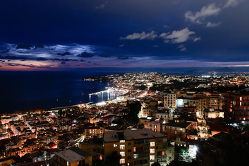 Night view of the city of Naples and its historic center, Italy.