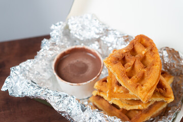 Delicious Waffles with Chocolate Sauce