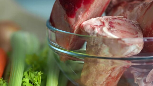 Bone broth. The cooking process and ingredients. Raw Marrow bone beef for making broth. Raw bones for cooking meat and bone broth, which is a source of natural collagen