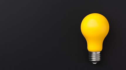 A Spark of Inspiration:  A single yellow light bulb stands out against a black backdrop, symbolizing creativity, innovation, and the power of ideas.