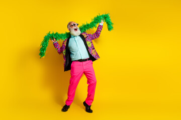Full length portrait of crazy grandfather dance hold hawaii necklace wear pink pants blazer empty...