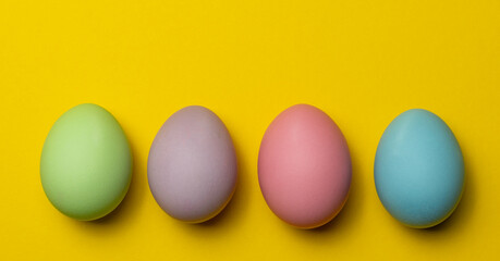 Easter eggs on a yellow background