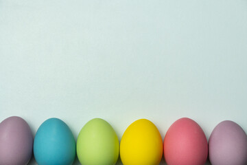 Easter eggs on light background with copy space for text