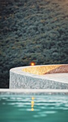 Serene Infinity Pool  Modern Architecture  Luxury Resort  Calm Water  Golden Accents  Tran