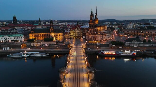 Drone footage of Augustus Bridge (Augustusbrucke) at night in Dresden, Germany