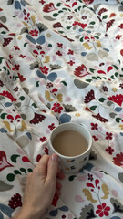 Coffee mug with a cozy blanket, perfect for winter, comfort, relaxation, home decor, and lifestyle promotions