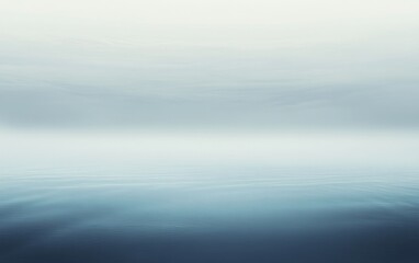 Obraz premium A calming gradient background with ocean mist colors.featuring soft blues and grays.evoking peace and tranquility.ideal for nature-themed content and morning designs