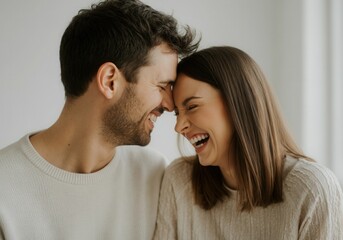 Obraz premium Young couple sharing a tender moment of laughter and complicity
