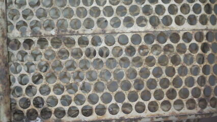 Rusty circle patterns on metal surface