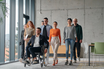 A team ofbusiness professionals moves through a spacious, modern office, assisting their leader, a...