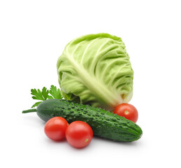Fresh whole vegetables for summer salad. Green cabbage, cucumber and cherry tomatoes isolated on white background.
