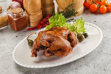 Baked small chicken with spices