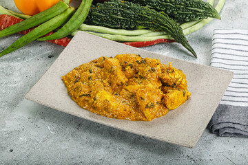 Spicy chicken masala in the bowl