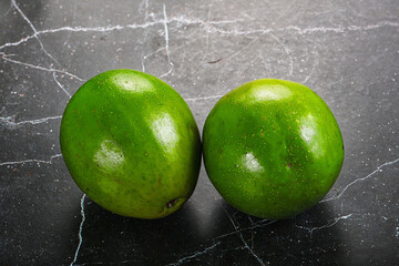 Two ripe green exotic avocado fruit