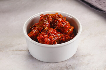 Spicy pickled raw green mango