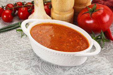 Hot tomato soup with diced chicken