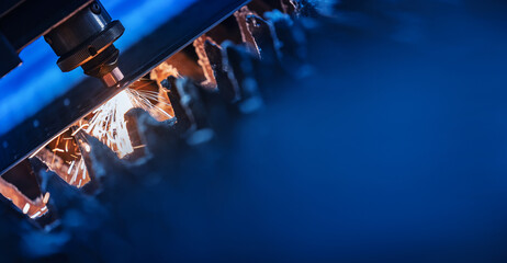 Blue color Laser CNC cut of metal with light spark, technology modern industrial, banner