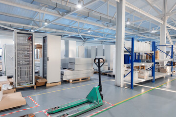 Modern industrial factory with electronic cabinets and equipment