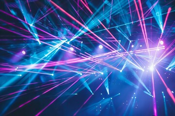 Obraz premium Colorful laser lights create a dynamic atmosphere in a vibrant entertainment setting.