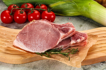 Raw pork steak loin with bone