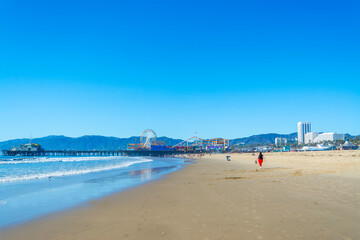 People in Santa Monica beach on a clear day