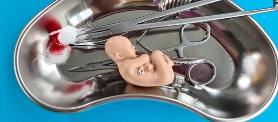 Symbol of child abortion and termination of pregnancy